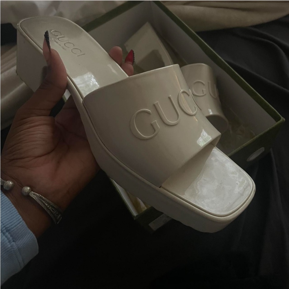 Gucci Cream Mules with Embossed Logo